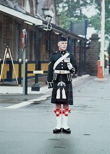 Awaiting arrival of the VIPs at the main gate