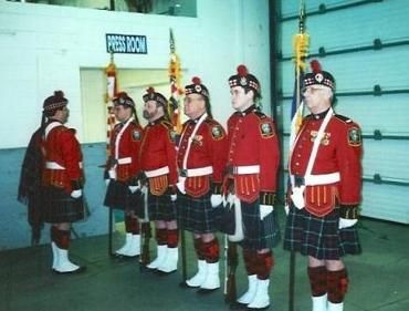 CSM inspects prior to parade with 1 Highlanders Pipes and Drums Tour of America.