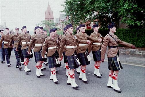 Highlander contingent march to the Memorial